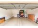 Spacious garage with clean epoxy flooring and ample storage for vehicles and belongings at 18537 W Mariposa Dr, Surprise, AZ 85374