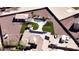 Stunning aerial view of the property highlighting a backyard pool, luscious turf, and a spacious perimeter at 18927 W Mitchell Ct, Litchfield Park, AZ 85340