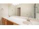 A bathroom featuring double sinks, a large mirror, and ample countertop space at 19861 S 191St St, Queen Creek, AZ 85142