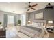 Virtually staged bedroom with a large window, soft carpet, and a calming color palette, offering a serene retreat at 19861 S 191St St, Queen Creek, AZ 85142