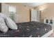 Bedroom with an open closet and a floor lamp at 200 E Southern Ave # 173, Tempe, AZ 85282