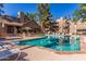 Enjoy the community pool with lounge chairs and umbrella covered tables perfect for relaxing on hot summer days at 200 E Southern Ave # 173, Tempe, AZ 85282