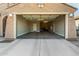 Spacious two-car garage with ample room for vehicles and storage, featuring clean lines and a well-lit interior at 21362 N 260Th Ln, Buckeye, AZ 85396