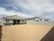 Unfinished backyard, showing surrounding houses and the beginning stages of construction at 2401 E Spur Dr, San Tan Valley, AZ 85140