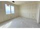 Unfinished bedroom featuring a large window, awaiting final finishes and personalization at 2401 E Spur Dr, San Tan Valley, AZ 85140