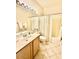 Bathroom featuring a vanity with sink, toilet, and tub with shower at 2509 E Paraiso Dr, Phoenix, AZ 85024