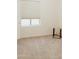 Neutral bedroom featuring plush carpeting, window and compact display table at 2509 E Paraiso Dr, Phoenix, AZ 85024