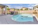 Inviting backyard features a sparkling pool and a relaxing hot tub with pergola for outdoor enjoyment at 2592 E Torrey Pines Ln, Chandler, AZ 85249