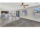 Open floor plan showcasing the living room flowing into the kitchen with modern finishes at 2592 E Torrey Pines Ln, Chandler, AZ 85249