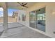 View from the covered patio to the hot tub and pool outside the sliding glass door at 2592 E Torrey Pines Ln, Chandler, AZ 85249