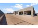 Exterior view of the back of the home featuring a covered patio, and desert landscaping at 26657 W Renee Dr, Buckeye, AZ 85396