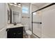 Modern bathroom featuring a glass shower and sleek black hardware at 26817 W Renee Dr, Buckeye, AZ 85396