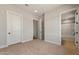 A spacious bedroom showcases the en-suite bathroom and closet layout at 26817 W Renee Dr, Buckeye, AZ 85396