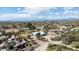 Expansive aerial view of a desert community with custom homes and mountain views in the distance at 28404 N 67Th St, Cave Creek, AZ 85331