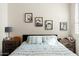 Well-lit bedroom with motorcycle art above the bed and shuttered windows at 28404 N 67Th St, Cave Creek, AZ 85331