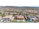 Aerial view of neighborhood, mountains, and surrounding area at 30804 N 120Th Ave, Peoria, AZ 85383