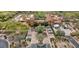 Aerial view of a sprawling home with a large driveway and mature trees, surrounded by lush landscaping at 30804 N 120Th Ave, Peoria, AZ 85383