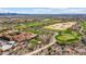 Expansive estate with manicured lawns and lush desert landscaping, and golf course views in the background at 30804 N 120Th Ave, Peoria, AZ 85383