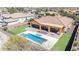 Stunning backyard pool, putting green, and covered patio with beautiful desert views, perfect for entertaining at 30804 N 120Th Ave, Peoria, AZ 85383