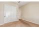 Bedroom with sliding closet door and doorway at 30804 N 120Th Ave, Peoria, AZ 85383