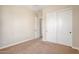 Bright bedroom with double closet and open doorway at 30804 N 120Th Ave, Peoria, AZ 85383