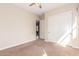 Bedroom with a doorway and closet doors at 30804 N 120Th Ave, Peoria, AZ 85383