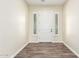 Inviting foyer with wood-look tile flooring and a white front door with sidelights at 30804 N 120Th Ave, Peoria, AZ 85383