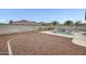 Backyard with a pool area enclosed by a fence and a rock landscape at 3115 W Molly Ln, Phoenix, AZ 85083