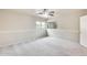 Cozy bedroom featuring neutral walls, plush carpeting, and natural light from windows at 3115 W Molly Ln, Phoenix, AZ 85083