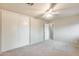 Bedroom featuring neutral walls and carpet with large closet at 3115 W Molly Ln, Phoenix, AZ 85083