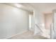 Hallway featuring neutral walls, carpet, and staircase access at 3115 W Molly Ln, Phoenix, AZ 85083