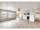 Bright living room with lots of windows, wood floors, and open layout at 3115 W Molly Ln, Phoenix, AZ 85083