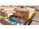 Aerial backyard view featuring a private pool, covered patio, and well-maintained landscaping at 3322 E Lantana Pl, Chandler, AZ 85286