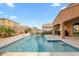 Backyard pool with well-kept deck and landscaping; ready for relaxation and entertaining at 3322 E Lantana Pl, Chandler, AZ 85286