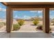 A backyard view from under the house's covered patio at 35207 N Central Ave, Phoenix, AZ 85086