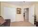 This bedroom features neutral walls, a closet, and is adjacent to another room at 35207 N Central Ave, Phoenix, AZ 85086