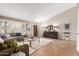 Bright living room featuring neutral color scheme, tile flooring, and lots of natural light at 35207 N Central Ave, Phoenix, AZ 85086