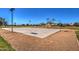 Well-lit community basketball court with mountain backdrop and professionally maintained hardscape at 3581 W Mineral Butte Dr, San Tan Valley, AZ 85144