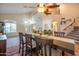 Dining room with vaulted ceilings, modern decor, and large table set for Gathering dining at 3581 W Mineral Butte Dr, San Tan Valley, AZ 85144