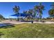 Community playground featuring a shaded picnic tables and play equipment at 3581 W Mineral Butte Dr, San Tan Valley, AZ 85144