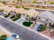 Aerial view of homes with well-manicured lawns and landscaping adding curb appeal to the properties at 3581 W Mineral Butte Dr, San Tan Valley, AZ 85144