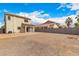 Large backyard with a covered patio and block fence and room for customization at 35973 W Velazquez Dr, Maricopa, AZ 85138