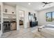 Serene main bedroom with a mini-bar area, ensuite bathroom, and stylish décor at 377 E Windsor Ave # 16, Phoenix, AZ 85004