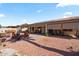 An inviting backyard with pavers, seating, and low-maintenance desert landscaping at 4068 N 155Th Ln, Goodyear, AZ 85395