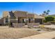 Charming home featuring desert landscaping and a neutral color palette at 4865 E Princess Dr, Mesa, AZ 85205