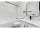 Bright bathroom featuring sleek fixtures, a modern sink, and a shower-tub combination at 525 S 99Th St, Mesa, AZ 85208