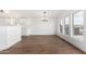 Bright dining area featuring wood-look floors and contemporary lighting at 525 S 99Th St, Mesa, AZ 85208