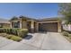 Inviting single-story home with a two-car garage and low maintenance front yard at 5360 S 98Th Pl, Mesa, AZ 85212