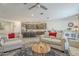 Open concept living room with a ceiling fan, connecting to a modern kitchen at 5360 S 98Th Pl, Mesa, AZ 85212