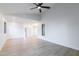 This bright living room has a ceiling fan, light wood floors, and recessed lighting at 5449 E Cambridge Ave, Phoenix, AZ 85008